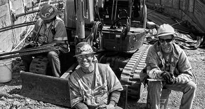 Workers smiling